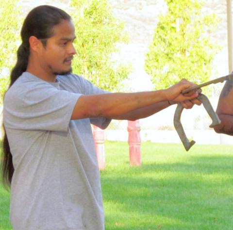 Clinton Arres takes aim during a horseshoe tournament at the End of Summer Bash at the Soboba Band of Luiseño Indians sports complex on Aug. 6 Clinton Arres takes aim during a horseshoe tournament at the End of Summer Bash at the Soboba Band of Luiseño Indians sports complex on Aug. 6