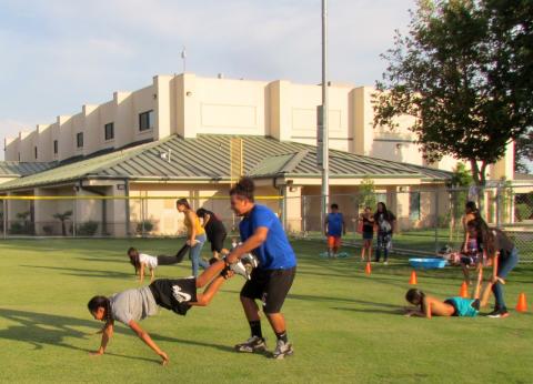 Boys and girls enjoy a wheelbarrow race during Soboba’s End of Summer Bash on Aug. 6 Boys and girls enjoy a wheelbarrow race during Soboba’s End of Summer Bash on Aug. 6