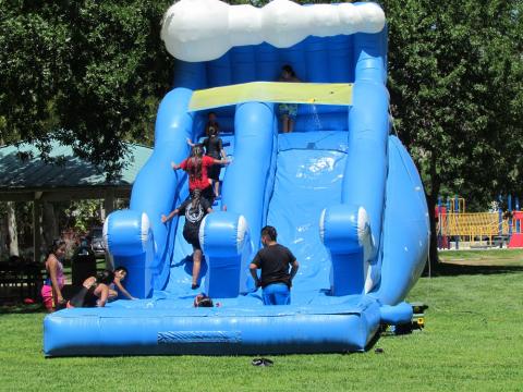 Kids of all ages take their turn on the giant water slide during the End of Summer Bash at the Soboba Reservation Kids of all ages take their turn on the giant water slide during the End of Summer Bash at the Soboba Reservation