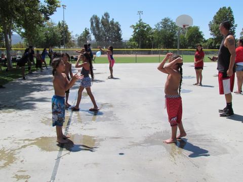 A water balloon toss game is overseen by Soboba Parks and Recreation staff during the End of Summer Bash at the Soboba Sports Complex on Aug. 26 A water balloon toss game is overseen by Soboba Parks and Recreation staff during the End of Summer Bash at the Soboba Sports Complex on Aug. 26