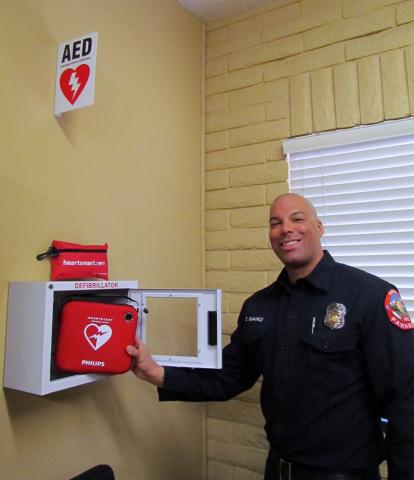 Firefighter Paramedic Eric Suarez installs an AED unit at Soboba’s Department of Public Safety within the Old Tribal Hall Firefighter Paramedic Eric Suarez installs an AED unit at Soboba’s Department of Public Safety within the Old Tribal Hall