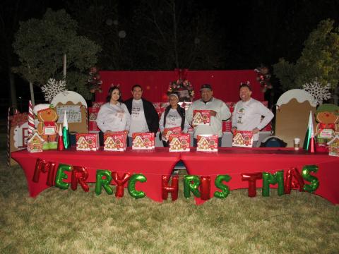 Gingerbread house building kits are given to visitors of Soboba’s 4th annual Tree Lighting Ceremony and Light Parade by members of the Soboba Foundation and Tribal Administration Gingerbread house building kits are given to visitors of Soboba’s 4th annual Tree Lighting Ceremony and Light Parade by members of the Soboba Foundation and Tribal Administration