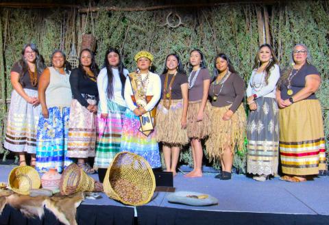 The $ovóova Po’$wáamay Committee joins current title holder and this year’s candidates at the crowning ceremony, Oct. 10. From left, Andrea Relopez, Carrie Garcia, Geneva Mojado, Iyana Briones, Su’la Arviso, So’a Nelson, Se’ish Lula Morillo, Raya Salgado, Monica Herrera, and Adona Salgado The $ovóova Po’$wáamay Committee joins current title holder and this year’s candidates at the crowning ceremony, Oct. 10. From left, Andrea Relopez, Carrie Garcia, Geneva Mojado, Iyana Briones, Su’la Arviso, So’a Nelson, Se’ish Lula Morillo, Raya Salgado, Monica Herrera, and Adona Salgado