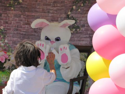 The Easter Bunny high fives a Soboba Tribal Preschool student during a pre-Spring Break event at the school on April 2 The Easter Bunny high fives a Soboba Tribal Preschool student during a pre-Spring Break event at the school on April 2