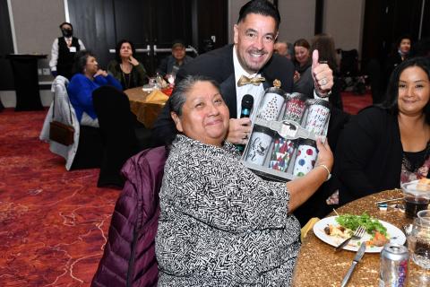 Emcee Luis “Lou” Pizarro of the television show “Operation Repo” presented Soboba Elder Francine Miranda with her raffle prize at the Elders New Year’s Eve party. Photo courtesy of Joan Fuller Emcee Luis “Lou” Pizarro of the television show “Operation Repo” presented Soboba Elder Francine Miranda with her raffle prize at the Elders New Year’s Eve party. Photo courtesy of Joan Fuller