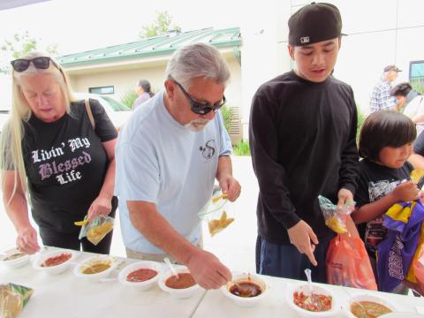 The salsa and tortilla contest attracts many voters with varying opinions of which one they liked most. From left, Deanne Wilcox, Clyde Wilcox, Darius Cabudol, and Ashwet Arellano take their time to taste each entry The salsa and tortilla contest attracts many voters with varying opinions of which one they liked most. From left, Deanne Wilcox, Clyde Wilcox, Darius Cabudol, and Ashwet Arellano take their time to taste each entry