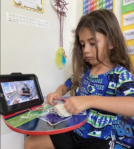 Soboba Tribal Preschool Kindergartner Aiden Bentiste makes pottery with the online assistance of Antonia Venegas (seen on iPad) during Native American Week studies Soboba Tribal Preschool Kindergartner Aiden Bentiste makes pottery with the online assistance of Antonia Venegas (seen on iPad) during Native American Week studies