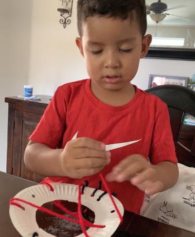 Eli Pineda made a dream catcher, one of several at-home activities that Soboba Tribal Preschool students were asked to complete for Native American Week Eli Pineda made a dream catcher, one of several at-home activities that Soboba Tribal Preschool students were asked to complete for Native American Week