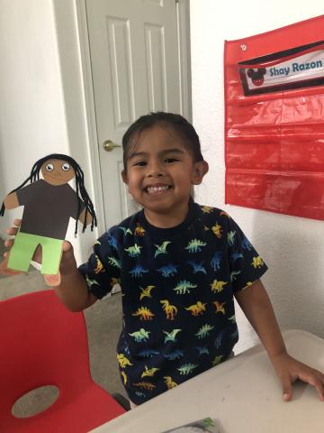 Soboba Tribal Preschool student Shay Razon with Native self-portrait he made for Native American Week during at-home distance learning Soboba Tribal Preschool student Shay Razon with Native self-portrait he made for Native American Week during at-home distance learning