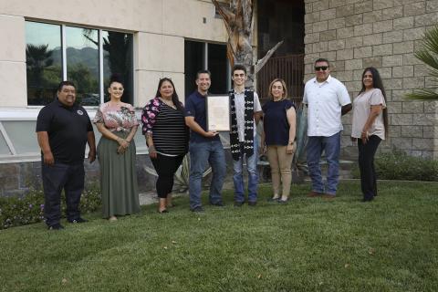 Francisco Garcia, Western Center Academy, is congratulated by Soboba Foundation representatives and presented with a scholarship on June 14. Pictured, from left, are Isaiah Vivanco, Catherine “Cat” Modesto, Antonia Briones-Venegas, Western Center Academy Principal Paul Bailey, Francisco and his mom Verónica, Daniel Valdez and Sally Moreno-Ortiz