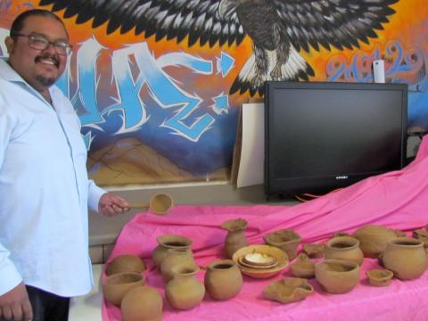 Harold Arres, Regional Prevention Manager for Soboba Tribal TANF, shows some of the clay pots that were made during a three-part series led by Tony Soares at the Soboba PRC site. Photo courtesy of Soboba Band of Luiseño Indians. Harold Arres, Regional Prevention Manager for Soboba Tribal TANF, shows some of the clay pots that were made during a three-part series led by Tony Soares at the Soboba PRC site. Photo courtesy of Soboba Band of Luiseño Indians.