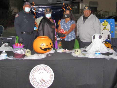 The Soboba Foundation was one of many Soboba tribal entities that were set up to interact with participants in Soboba’s Tribal Trunk or Treat drive-through event on Oct. 24. From left, Soboba Foundation’s Vice President Jacob Briones, President Dondi Silvas and Members at Large Sally Ortiz and Isaiah Vivanco The Soboba Foundation was one of many Soboba tribal entities that were set up to interact with participants in Soboba’s Tribal Trunk or Treat drive-through event on Oct. 24. From left, Soboba Foundation’s Vice President Jacob Briones, President Dondi Silvas and Members at Large Sally Ortiz and Isaiah Vivanco