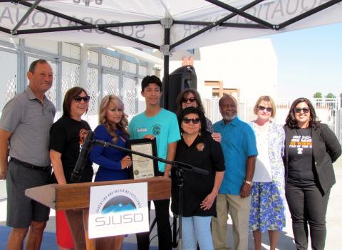 Soboba Band of Luiseño Indians member Rose Salgado, center, is joined by school board members, district superintendent and high school principal during the ribbon cutting for the new Soboba Aquatics Center at San Jacinto High School on Aug. 30. Soboba Band of Luiseño Indians member Rose Salgado, and School Board