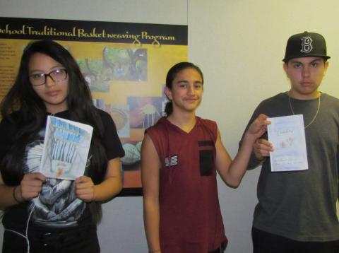 Student authors, from left, Vanessa Fernandez, Frank Moreno and Michael Briones read their fables to Soboba Tribal Preschool kindergartners as part of an AVID program project at Noli Indian School