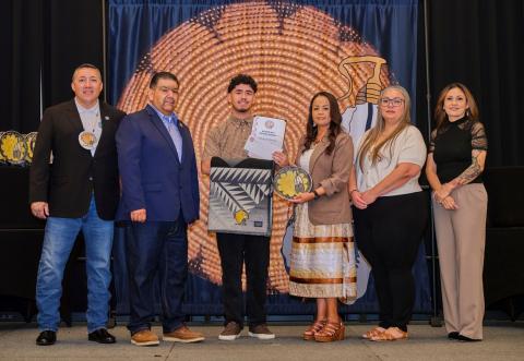 High School graduate Marco Hernandez is congratulated by Soboba Tribal Council. From left, Daniel Valdez, Isaiah Vivanco, Marco, Geneva Mojado, Adona Salgado, and Monica Herrera High School graduate Marco Hernandez is congratulated by Soboba Tribal Council. From left, Daniel Valdez, Isaiah Vivanco, Marco, Geneva Mojado, Adona Salgado, and Monica Herrera
