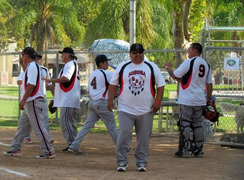 Soboba BBC coaches and players touch base after a successful inning during the 2017 NIAA Fast Pitch Softball Tournament Soboba BBC coaches and players touch base after a successful inning during the 2017 NIAA Fast Pitch Softball Tournament