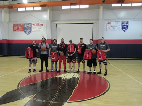 Captain Jim Archambault let his Plainzmen teammates to a first-place finish in a basketball tournament held at the Soboba Sports Complex gymnasium in February