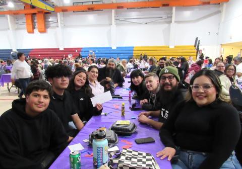 Brenda Muñoz, right, and her family enjoy the bingo night, especially after her niece Amber Ramos won the final game’s challenge and $500 Brenda Muñoz, right, and her family enjoy the bingo night, especially after her niece Amber Ramos won the final game’s challenge and $500