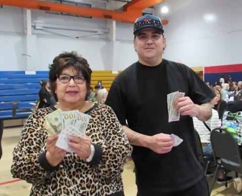 Marie McMurray, left, and Leland Razon split the prize money from one of the special Bingo blackout games rather than face a tiebreaker Marie McMurray, left, and Leland Razon split the prize money from one of the special Bingo blackout games rather than face a tiebreaker