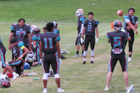 Players for Team Wagon Burners warm up before the second annual Indigenous Bowl on June 29 at the Soboba Indian Reservation near San Jacinto Players for Team Wagon Burners warm up before the second annual Indigenous Bowl on June 29 at the Soboba Indian Reservation near San Jacinto