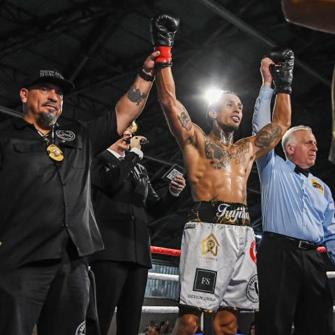 David Longoria Trujillo is declared the winner after a recent bout. The boxer is a product of House of Pain So Cal in Temecula, whose co-owner is Dave Trujillo, at left David Longoria Trujillo is declared the winner after a recent bout. The boxer is a product of House of Pain So Cal in Temecula, whose co-owner is Dave Trujillo, at left