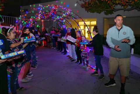 Soboba Foundation Secretary Andy Silvas, right, passes along toys from the Soboba charter bus at Tahquitz High School, Dec. 7. Photo courtesy of StylePhotography by Alex Tapia Soboba Foundation Secretary Andy Silvas, right, passes along toys from the Soboba charter bus at Tahquitz High School, Dec. 7. Photo courtesy of StylePhotography by Alex Tapia