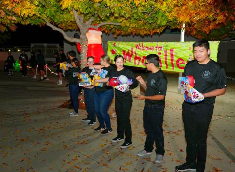 Ten members of the Hemet Police Department Explorers help form a toy brigade at Tahquitz High School to unload the Soboba bus. Photo courtesy of StylePhotography by Alex Tapia Ten members of the Hemet Police Department Explorers help form a toy brigade at Tahquitz High School to unload the Soboba bus. Photo courtesy of StylePhotography by Alex Tapia