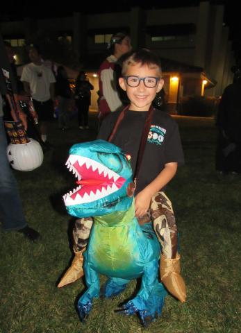 Bruce Valdez, 6, is voted as having the Most Creative costume in his age group category during the annual Halloween Carnival Bruce Valdez, 6, is voted as having the Most Creative costume in his age group category during the annual Halloween Carnival