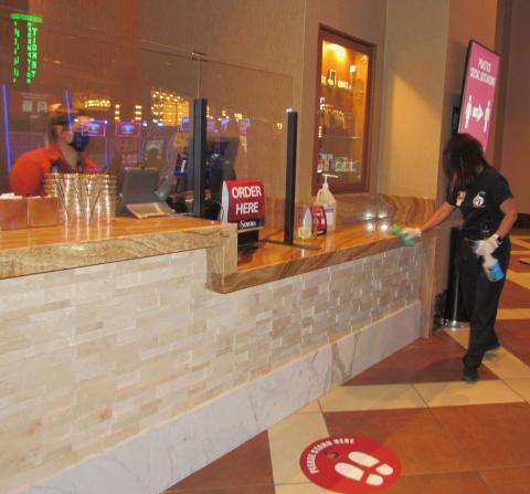Marlen Shuler, who started working as a valet at the Soboba Casino Resort when it opened last spring, has been temporarily reassigned to the Soboba Clean Team and said she loves it. Here she wipes down the customer counter at Elements, one of the eateries currently open for guests Marlen Shuler, who started working as a valet at the Soboba Casino Resort when it opened last spring, has been temporarily reassigned to the Soboba Clean Team and said she loves it. Here she wipes down the customer counter at Elements, one of the eateries currently open for guests