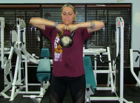 Tekla Diaz lifts a 30-pound kettlebell several times during one of the series of exercises that were given at a recent boot camp, being taught by personal trainer Daniel Mazza, at the Soboba Sports Complex Tekla Diaz lifts a 30-pound kettlebell several times during one of the series of exercises that were given at a recent boot camp, being taught by personal trainer Daniel Mazza, at the Soboba Sports Complex