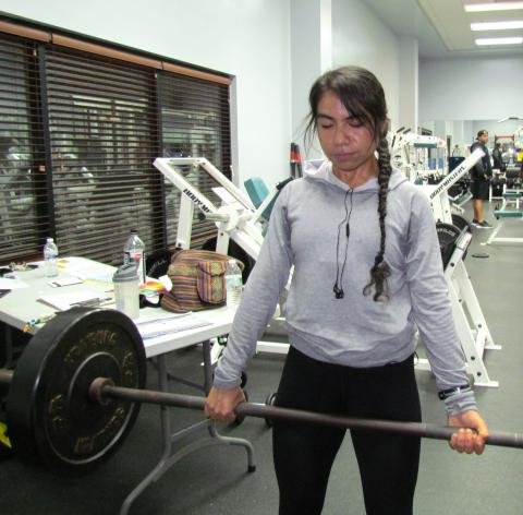 Alyssa Reina prepares to lift weights during a workout at the Soboba Sports Complex Alyssa Reina prepares to lift weights during a workout at the Soboba Sports Complex