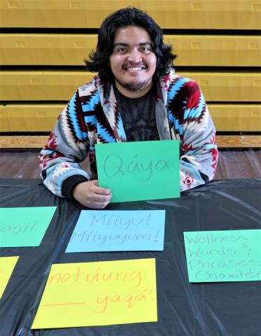 Anthony Hurtado shares some Luiseño language words related to health and wellness at his aunt’s Body, Mind & Spirit Wellness Fair at the Soboba Sports Complex, March 13