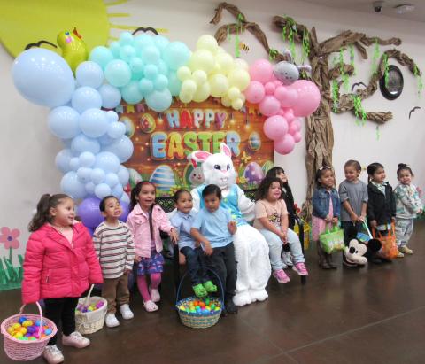 Preschoolers pose with the Easter bunny at the multipurpose room after a successful Easter egg hunt at the Soboba Tribal Preschool playground Preschoolers pose with the Easter bunny at the multipurpose room after a successful Easter egg hunt at the Soboba Tribal Preschool playground
