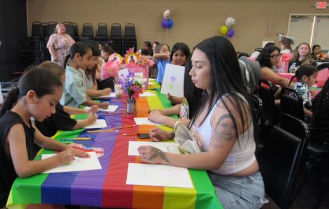 Moms and their children follow along to an art lesson taught during the “Mom, you color my world” Mother’s Day event at the Soboba Tribal Preschool, May 9 Moms and their children follow along to an art lesson taught during the “Mom, you color my world” Mother’s Day event at the Soboba Tribal Preschool, May 9
