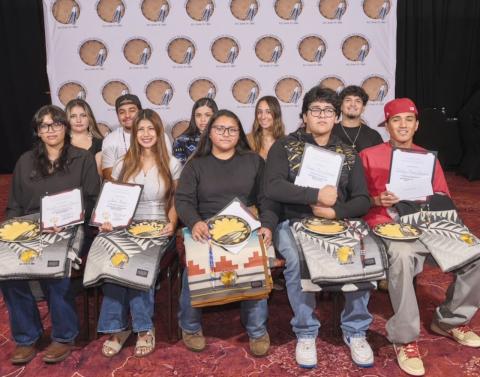 High school graduates are recognized with a certificate, cash envelope, lanyard, Pendleton blanket and a commemorative plate High school graduates are recognized with a certificate, cash envelope, lanyard, Pendleton blanket and a commemorative plate
