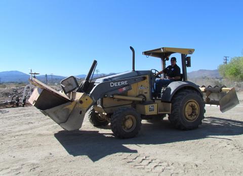 Soboba Public Works Department’s Ray Peterson operates a skip loader during the annual community cleanup day on July 23 Soboba Public Works Department’s Ray Peterson operates a skip loader during the annual community cleanup day on July 23