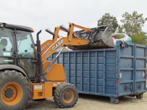 Soboba Public Works employee Julian Briones helps dump items into one of four 40-yard bins used to collect solid waste during the annual Community Cleanup Event at the Soboba Reservation last month Soboba Public Works employee Julian Briones helps dump items into one of four 40-yard bins used to collect solid waste during the annual Community Cleanup Event at the Soboba Reservation last month