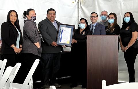 A proclamation by Riverside County Supervisor Yxstian Gutierrez is presented at the ribbon cutting ceremony for the new Soboba Indian Health Clinic. From left, Soboba Vice Chairwoman Geneva Mojado, Soboba Sergeant-at-Arms Kelli Hurtado, Soboba Chairman Isaiah Vivanco, RSBCIHI Board of Directors President Sherri Salgado, Riverside County Supervisor Yxstian Gutierrez, RSBCIHI CEO Bill Thomsen, Soboba Delegate Julie Arrietta-Parcero and Soboba Delegate Camille Diaz A proclamation by Riverside County Supervisor Yxstian Gutierrez is presented at the ribbon cutting ceremony for the new Soboba Indian Health Clinic. From left, Soboba Vice Chairwoman Geneva Mojado, Soboba Sergeant-at-Arms Kelli Hurtado, Soboba Chairman Isaiah Vivanco, RSBCIHI Board of Directors President Sherri Salgado, Riverside County Supervisor Yxstian Gutierrez, RSBCIHI CEO Bill Thomsen, Soboba Delegate Julie Arrietta-Parcero and Soboba Delegate Camille Diaz