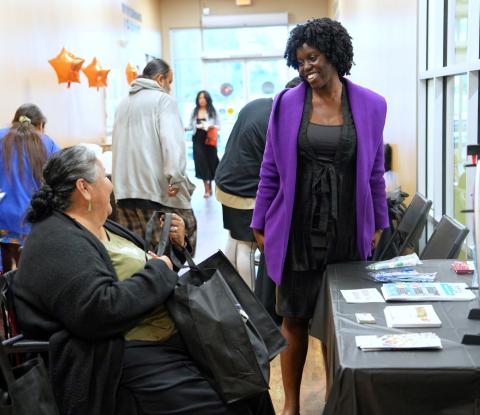 Nutrition Director Afua Khumalo, right, chats with visitors during the Riverside-San Bernardino County Indian Health Inc. Patient Appreciation Day at the Soboba Indian Health Clinic, Nov. 15 Nutrition Director Afua Khumalo, right, chats with visitors during the Riverside-San Bernardino County Indian Health Inc. Patient Appreciation Day at the Soboba Indian Health Clinic, Nov. 15