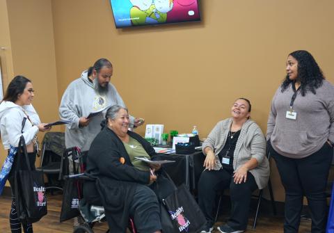 Community Prevention/Health Educator Kelli Hurtado, second from right, and Laboratory Manager Samantha Byers, far right, share information with visitors during the Riverside-San Bernardino County Indian Health Inc. Patient Appreciation Day Community Prevention/Health Educator Kelli Hurtado, second from right, and Laboratory Manager Samantha Byers, far right, share information with visitors during the Riverside-San Bernardino County Indian Health Inc. Patient Appreciation Day