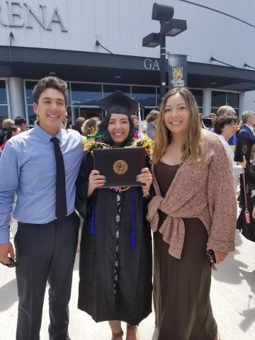 Sia Knutzen, center, is joined by her brother Jeremy and sister Shayne after her graduation from the University of Colorado at Colorado Springs in 2016 Sia Knutzen, center, is joined by her brother Jeremy and sister Shayne after her graduation from the University of Colorado at Colorado Springs in 2016