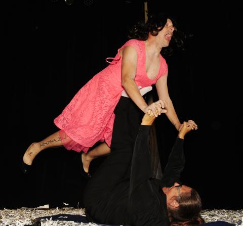 Miguel Sarasa is balanced by Michelle Kerlin during their performance of "Time of My Life" during Friday’s 11th annual Lip Sync Contest at ACs Lounge at the Soboba Casino Miguel Sarasa is balanced by Michelle Kerlin during their performance of "Time of My Life" during Friday’s 11th annual Lip Sync Contest at ACs Lounge at the Soboba Casino