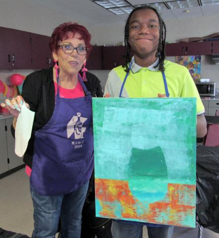 Art teacher Laura Ryan with West Valley High School student Joseph Blackburn as he shows his art project in progress during a recent Count on Art class Art teacher Laura Ryan with West Valley High School student Joseph Blackburn as he shows his art project in progress during a recent Count on Art class