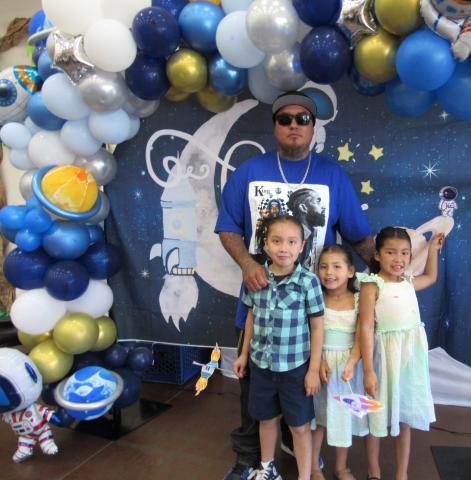 Mark Valdez has three times the fun at the Soboba Tribal Preschool early Father’s Day event. He celebrated with his kindergartner Tavish, preschooler Willow and Nu$uun who is in Pre-K Mark Valdez has three times the fun at the Soboba Tribal Preschool early Father’s Day event. He celebrated with his kindergartner Tavish, preschooler Willow and Nu$uun who is in Pre-K