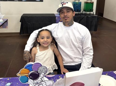 Gabe Herrera with his daughter Palkí, a kindergarten student, enjoy time together at her school’s special event, May 23 Gabe Herrera with his daughter Palkí, a kindergarten student, enjoy time together at her school’s special event, May 23