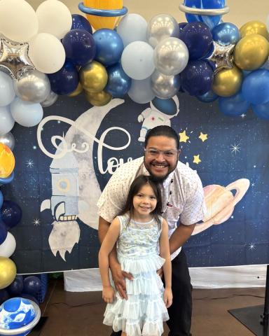 Charles Resvaloso and his and kindergarten student Paa’akal share a special moment at the early Father’s Day celebration Charles Resvaloso and his and kindergarten student Paa’akal share a special moment at the early Father’s Day celebration