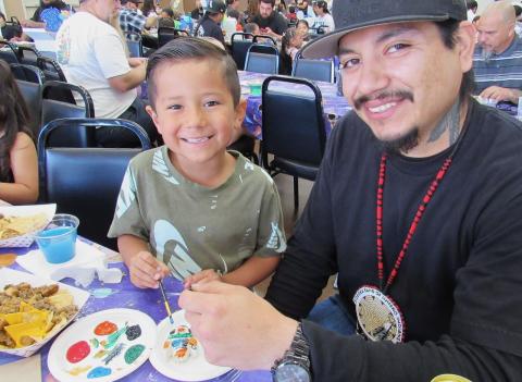 Father and son, both named Anthony Ortega, get into a painting craft at the Father’s Day celebration, May 23 Father and son, both named Anthony Ortega, get into a painting craft at the Father’s Day celebration, May 23