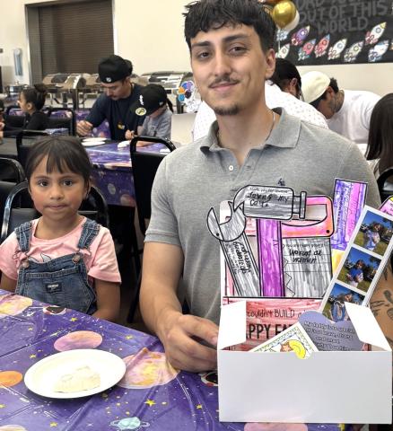 Kindergartner Emilia Chapparosa shares the gifts she made with her dad, Jarrod Chapparosa Kindergartner Emilia Chapparosa shares the gifts she made with her dad, Jarrod Chapparosa