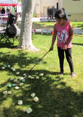 Neshuun Ontiveros, 7,  plays a recycling game at the 11th annual Soboba Tribal Earth Day event on April 20 Neshuun Ontiveros, 7,  plays a recycling game at the 11th annual Soboba Tribal Earth Day event on April 20