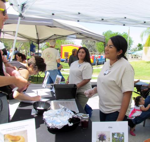 Soboba Cultural Department representatives talk to guests about chia seeds and mesquite during an Earth Day celebration Soboba Cultural Department representatives talk to guests about chia seeds and mesquite during an Earth Day celebration